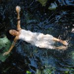 floating bridal cenote trash the dress photography in cozumel